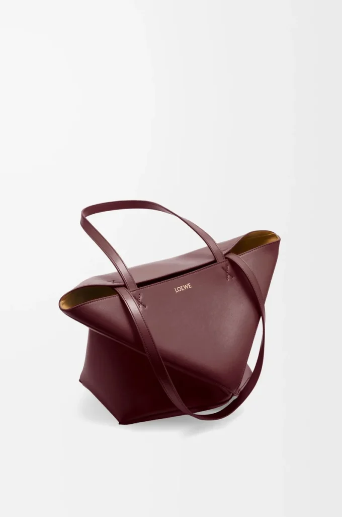 Medium Puzzle Fold Tote aus glänzendem Kalbsleder in Dark Burgundy