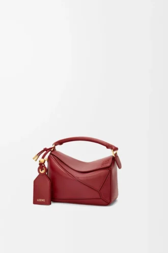 Mini Featherlight Puzzle Tasche aus Nappalammleder in Burnt Red