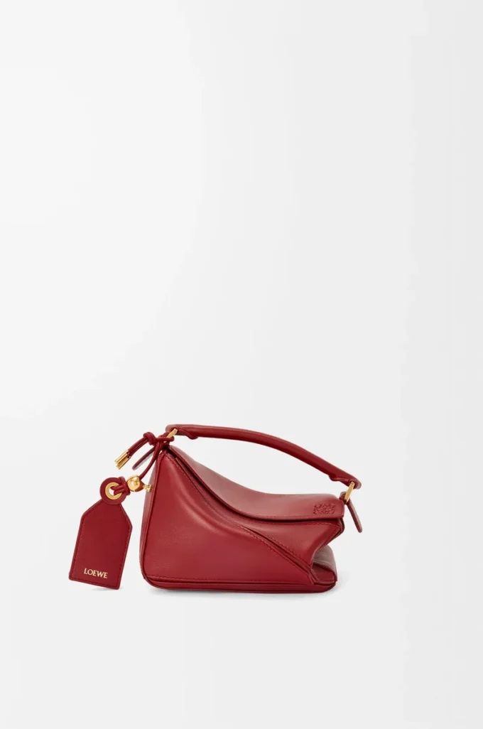 Mini Featherlight Puzzle Tasche aus Nappalammleder in Burnt Red