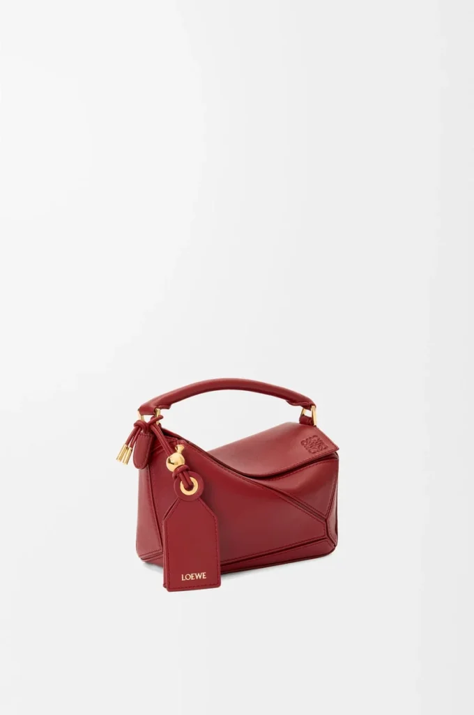 Mini Featherlight Puzzle Tasche aus Nappalammleder in Burnt Red