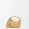 Mini Featherlight Puzzle Tasche aus Nappalammleder in Dark Butter