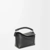 Mini Puzzle Edge Tasche aus klassischem Kalbsleder in Schwarz