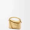 Mini Puzzle Edge Tasche aus laminiertem Lammleder Gold