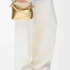Mini Puzzle Edge Tasche aus laminiertem Lammleder Gold