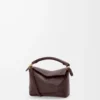 Mini Puzzle Edge Tasche aus weichem genarbtem Kalbsleder Dark Chestnut