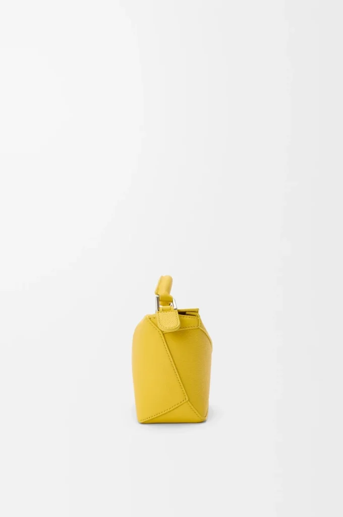 Mini Puzzle Edge Tasche aus weichem genarbtem Kalbsleder in Dandelion