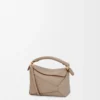 Mini Puzzle Edge Tasche aus weichem genarbtem Kalbsleder Sand