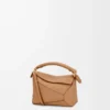 Mini Puzzle Edge Tasche aus weichem genarbtem Kalbsleder Toffee