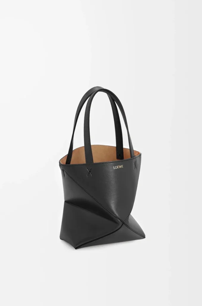 Mini Puzzle Fold Tote aus glänzendem Kalbsleder in Schwarz