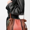 Mittlere Flamenco-Clutch Landscape aus Nappakalbsleder in Pecan/Parrot Pink