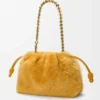 Mittlere Flamenco-Handtasche aus Lammfell Gelb