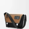 Mittlere Flex Messenger aus Canvas und Wildleder Schwarz/Dunkelgold Mittlere Flex Messenger aus Canvas und Wildleder Schwarz/Dunkelgold