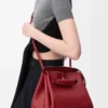 Mittlere Madrid-Tasche aus geschmeidigem Kalbsleder in Burnt Red