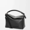 Mittlere Puzzle Edge Tasche aus klassischem Kalbsleder in Schwarz
