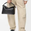 Mittlere Puzzle Edge Tasche aus klassischem Kalbsleder in Schwarz