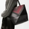 Mittlere Puzzle Fold-Tasche aus Nappakalbsleder Schwarz/Burgunderrot