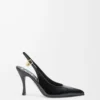 Neue Comic-Slingback-Pumps aus gemischtem Leder in Schwarz