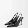 Neue Comic-Slingback-Pumps aus gemischtem Leder in Schwarz