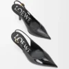Neue Comic-Slingback-Pumps aus gemischtem Leder in Schwarz