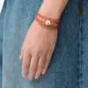Pebble-Armband aus Kalbsleder Orange/Gold