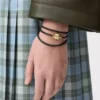 Pebble-Armband aus Kalbsleder Schwarz/Gold