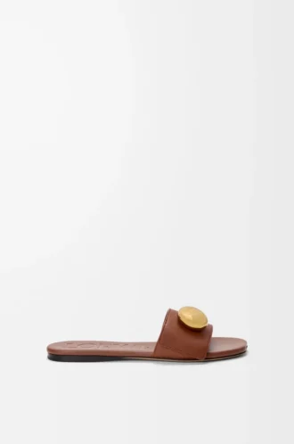 Pebble-Pantolette aus weichem Kalbsleder in Rust