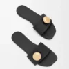 Pebble-Pantolette aus weichem Kalbsleder in Schwarz