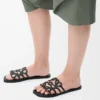 Petal Anagram Slipper aus weichem Kalbsleder in Schwarz