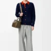 Polo-Strickjacke aus Wolle Marineblau/Orange