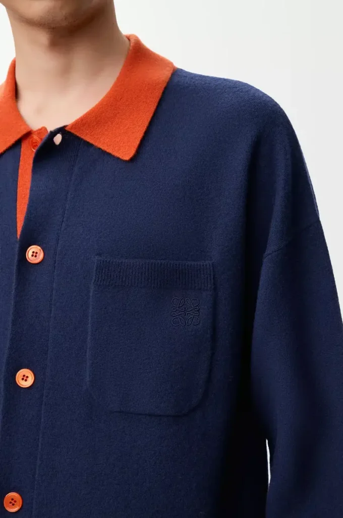 Polo-Strickjacke aus Wolle Marineblau/Orange