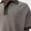 Polohemd aus Baumwolle in Khaki-Grün