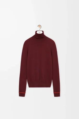 Pullover aus Wolle in Burgunderrot/Orange