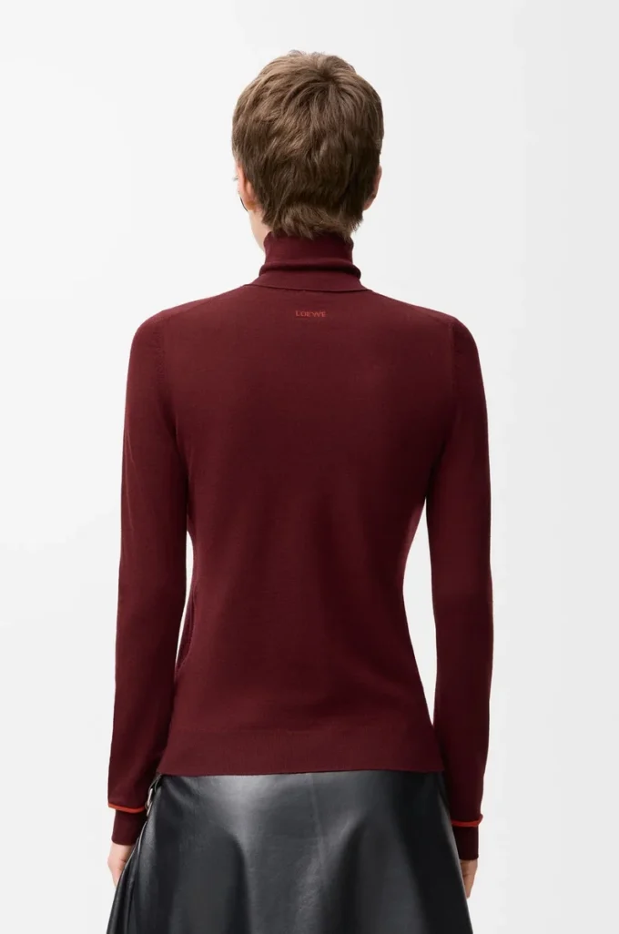 Pullover aus Wolle in Burgunderrot/Orange