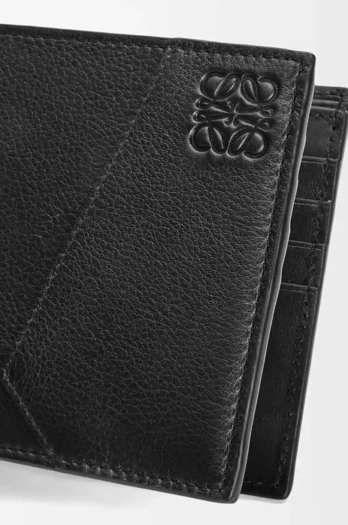 Puzzle-Bifold-Geldbörse aus klassischem Kalbsleder in Schwarz