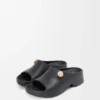 Schaumstoff-Pebble-Pantolette Schwarz/Gold