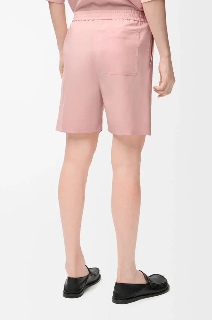 Shorts aus Wolle in Korallenrot