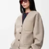 Strickjacke aus Wolle und Kaschmir Sandstein/Weiß