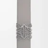 Wendbarer Anagram-Gürtel aus glattem Kalbsleder Tan/Asphalt Grey/Pewter