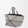 XXL Puzzle Fold Tote aus Jacquard-Canvas und Kalbsleder in Natur/Schwarz