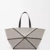 XXL Puzzle Fold Tote aus Jacquard-Canvas und Kalbsleder in Natur/Schwarz